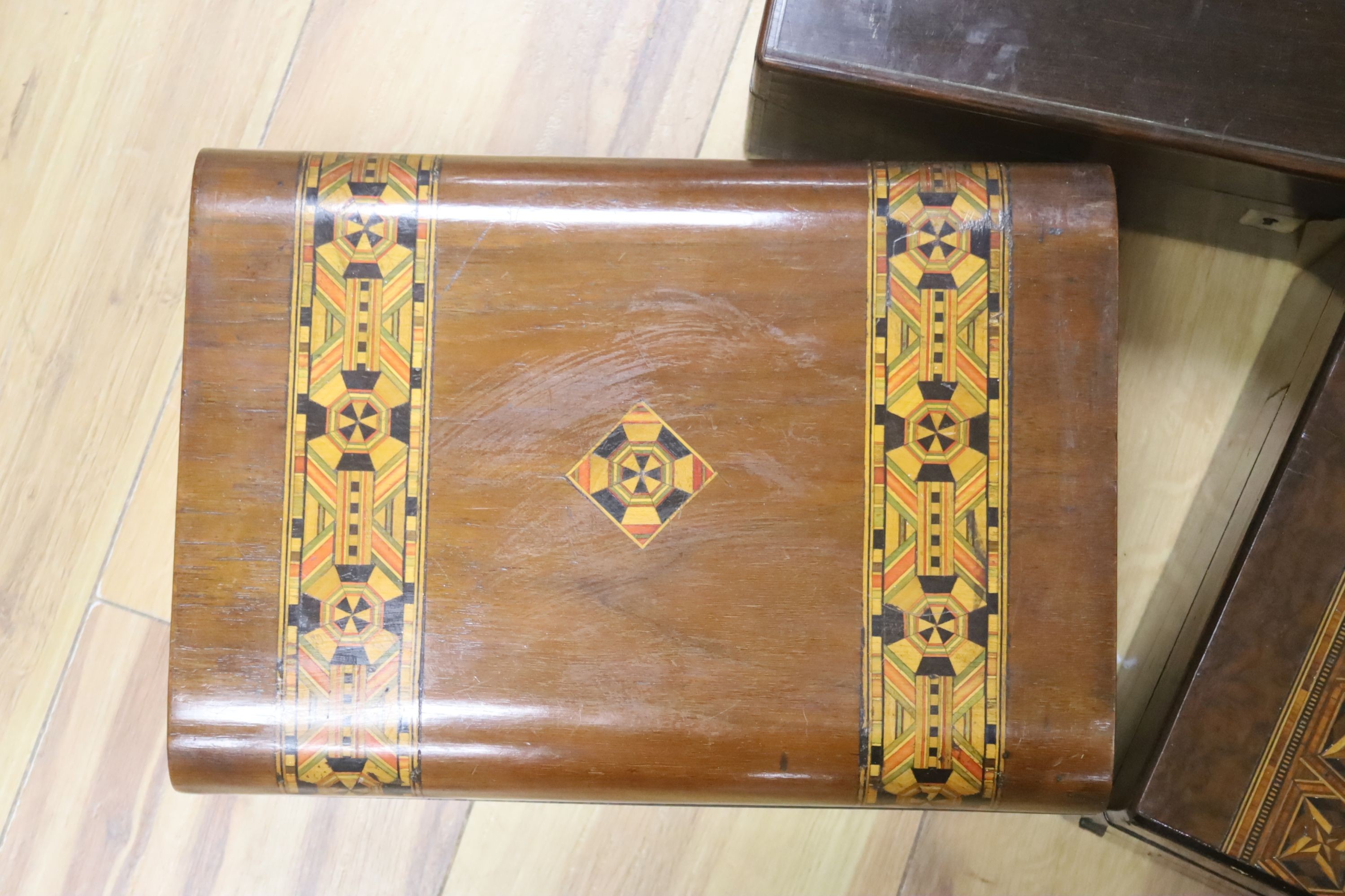 A Victorian rosewood writing box and two Victorian walnut and parquetry boxes